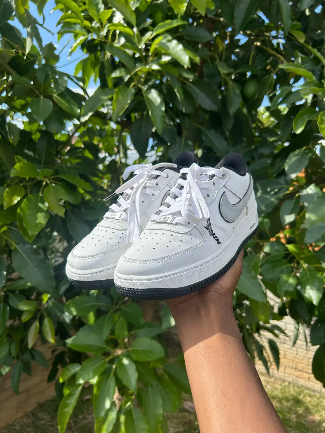 The same white Air Force 1 after a deep clean and outsole whitening
