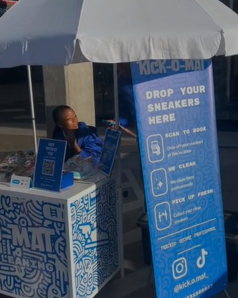 The Kick-O-Mat drop-off cart, with a branded bin that reads Drop your sneakers here